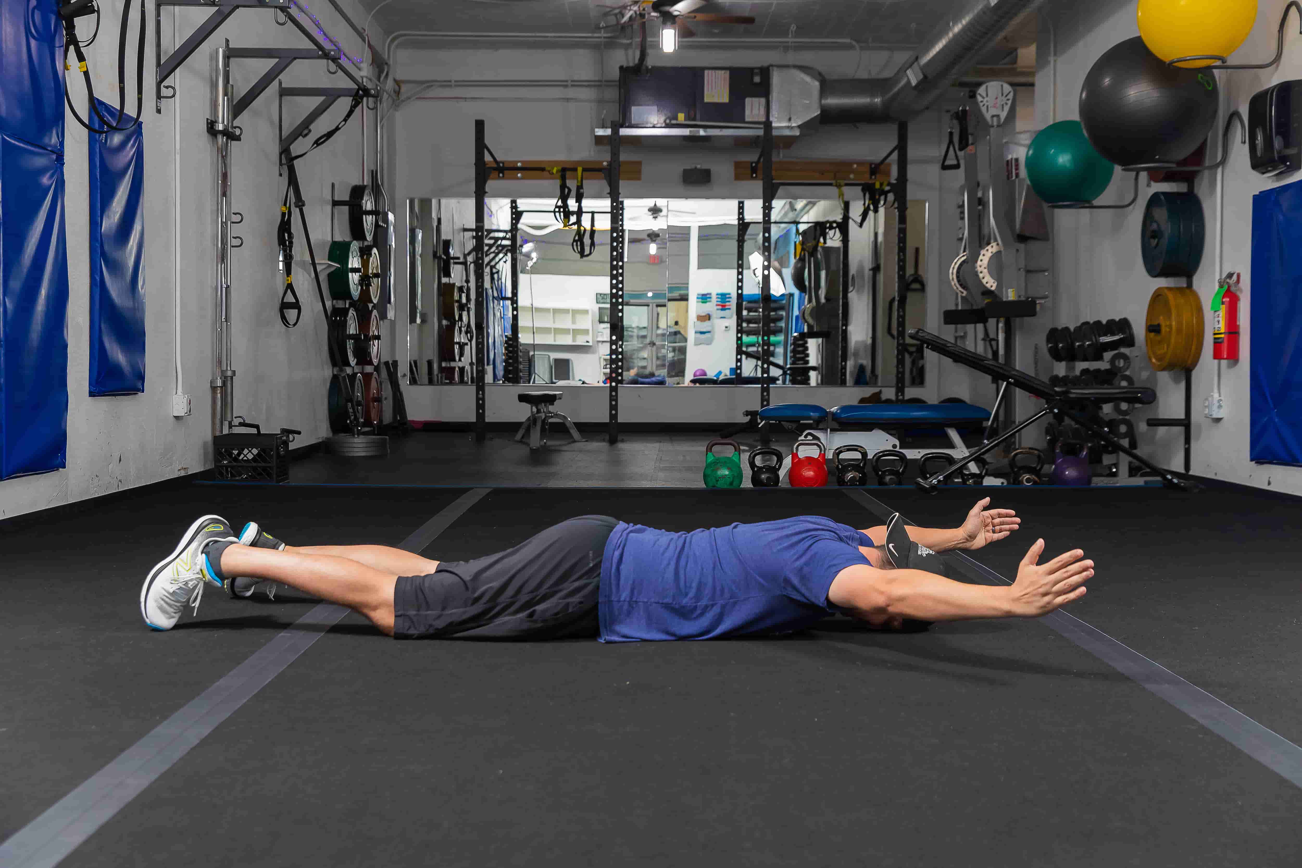 Austin personal trainer demonstrating force couples exercise for pain-free movement